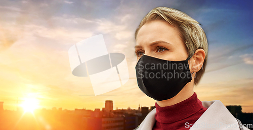 Image of woman wearing protective reusable barrier mask