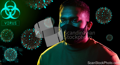 Image of african american man wearing black reusable mask