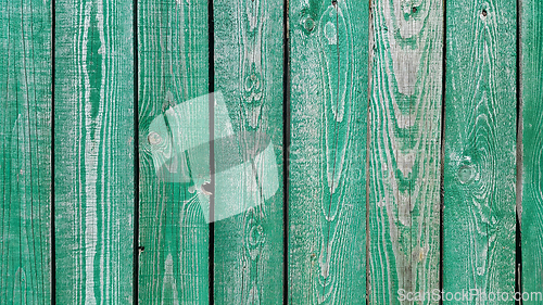 Image of Texture of weathered wooden green painted fence