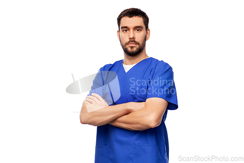 Image of doctor or male nurse in blue uniform