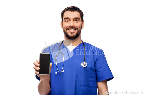 Image of smiling doctor or male nurse with smartphone