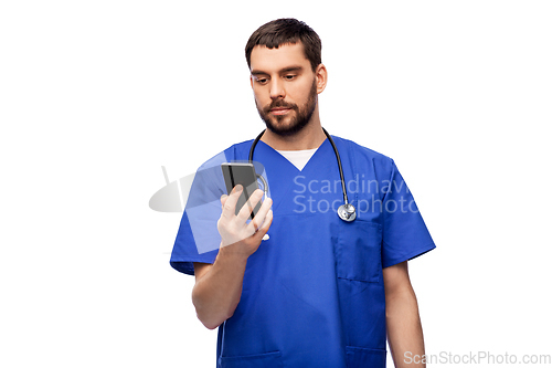 Image of doctor or male nurse using smartphone