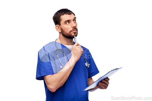 Image of doctor or male nurse with clipboard