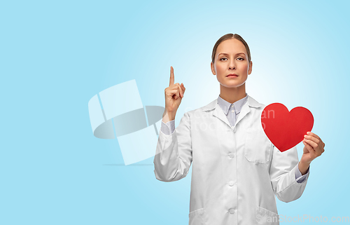 Image of female doctor with heart pointing finger up