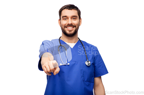 Image of smiling doctor or male nurse pointing to camera