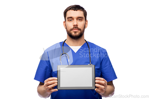 Image of doctor or male nurse showing tablet computer