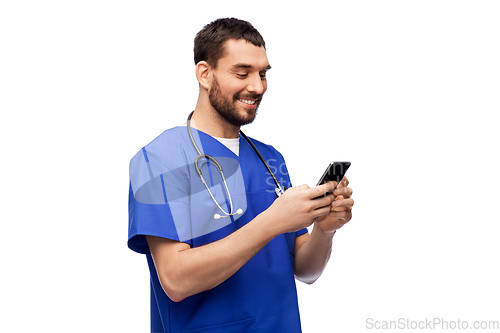 Image of smiling doctor or male nurse using smartphone