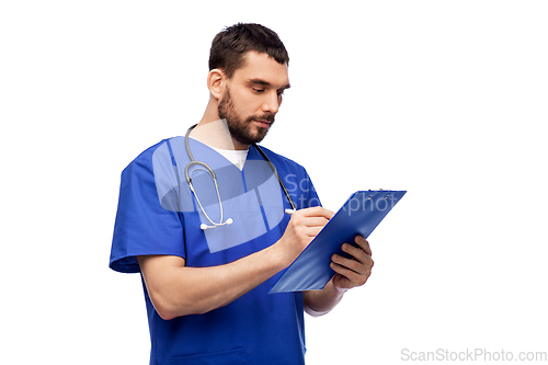 Image of male doctor writing medical report on clipboard