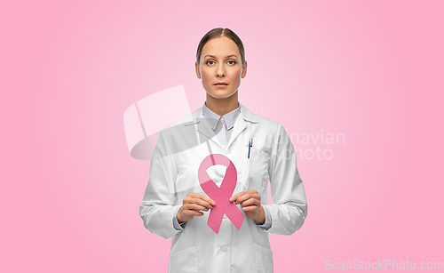 Image of female doctor with breast cancer awareness ribbon