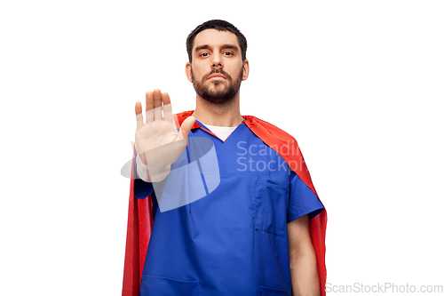 Image of doctor or male nurse in superhero cape