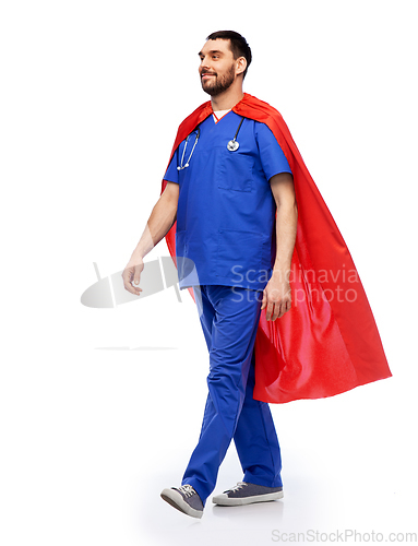 Image of smiling doctor or male nurse in superhero cape