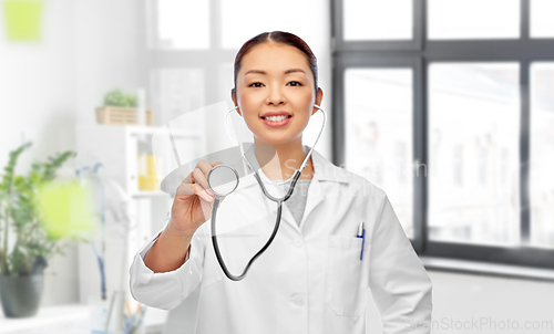 Image of close up of asian female doctor with stethoscope