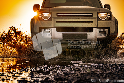 Image of Off road tourist car rides off-road in the highlands. Expedition