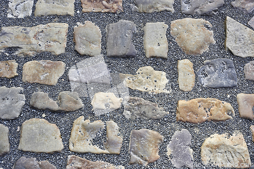 Image of Paving stones road with gravel