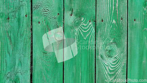 Image of Texture of weathered wooden green painted fence