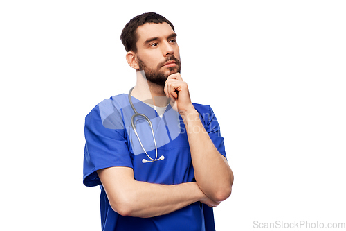Image of thinking doctor or male nurse with stethoscope