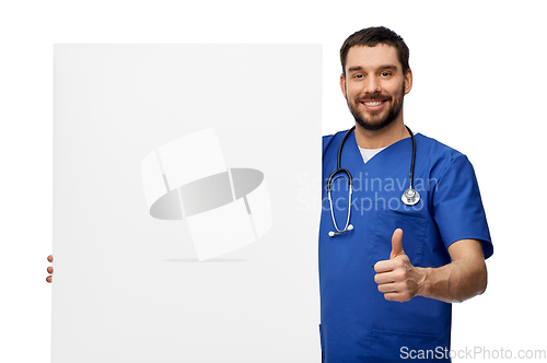 Image of male doctor with white board showing thumbs up