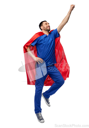 Image of doctor or male nurse in superhero cape flying