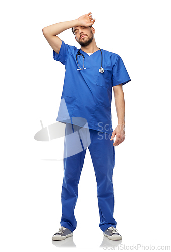 Image of tired doctor or male nurse with stethoscope
