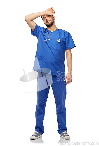 Image of tired doctor or male nurse with stethoscope