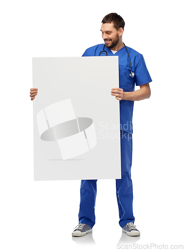 Image of smiling male doctor or nurse with big white board