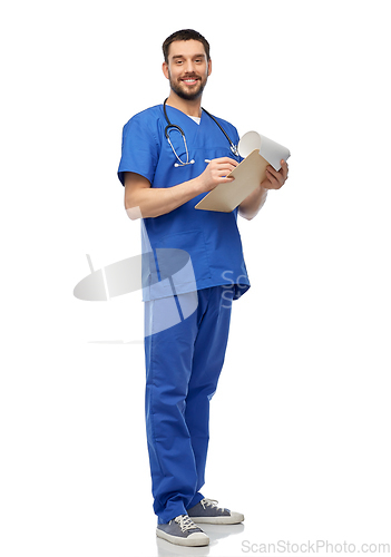 Image of male doctor writing medical report on clipboard