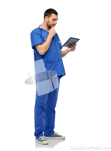 Image of doctor or male nurse using tablet computer