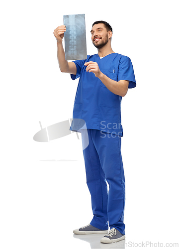 Image of happy smiling doctor or male nurse with x-ray