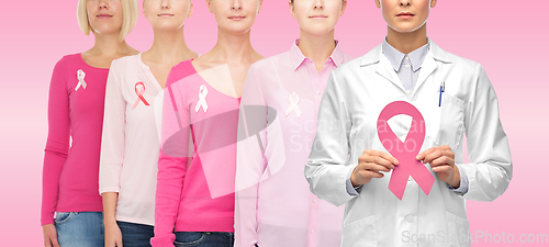 Image of doctor and women with cancer awareness ribbons