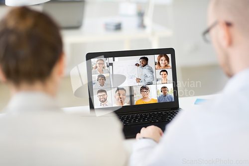 Image of business team having video conference at office
