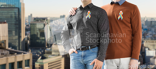 Image of close up of couple with gay pride ribbons in tokyo