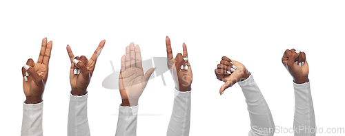 Image of hands of african woman showing various gestures