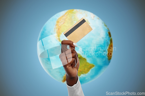 Image of hand of african american woman with credit card