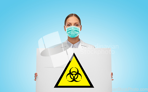 Image of female doctor in mask with biohazard sign