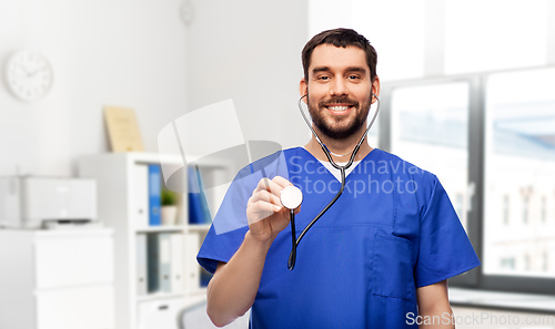 Image of smiling male doctor or nurse with stethoscope