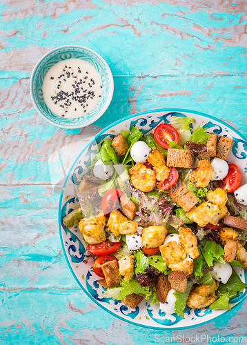 Image of Healthy Grilled Chicken Caesar Salad with Cheese and Croutons