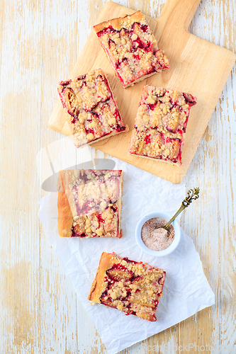 Image of Homemade plum cake with  yeast dough and crumbles