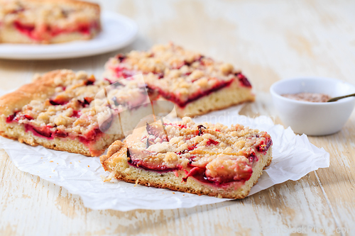 Image of Homemade plum cake with  yeast dough and crumbles