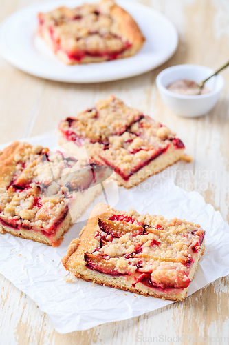 Image of Homemade plum cake with  yeast dough and crumbles