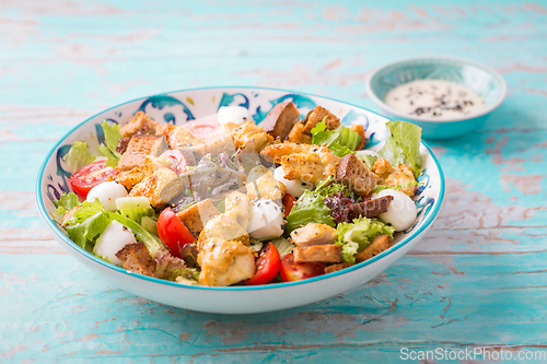 Image of Healthy Grilled Chicken Caesar Salad with Cheese and Croutons