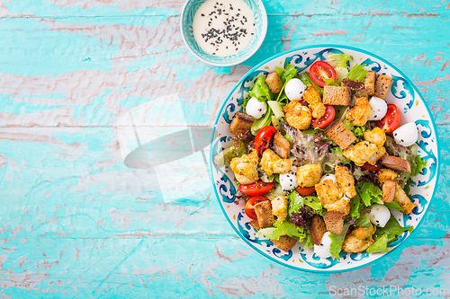 Image of Healthy Grilled Chicken Caesar Salad with Cheese and Croutons