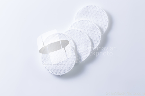 Image of Cotton pads with a shadow on white. Copy space for your text