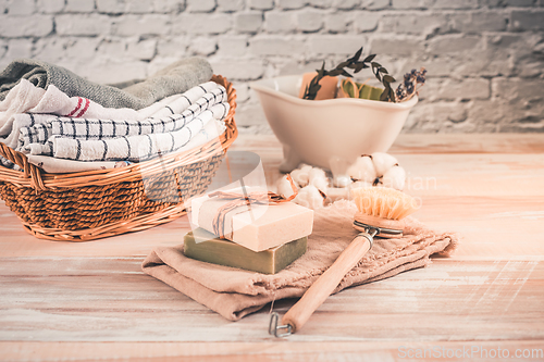 Image of Handmade natural bar soaps and cotton towels. Ethical, sustainable zero waste lifestyle