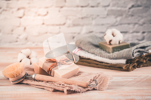 Image of Handmade natural bar soaps and cotton towels. Ethical, sustainable zero waste lifestyle
