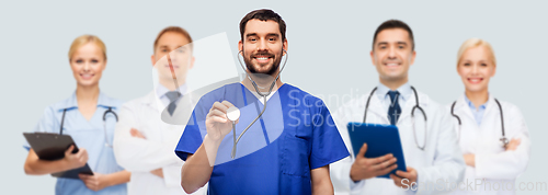 Image of smiling male doctor or nurse with stethoscope