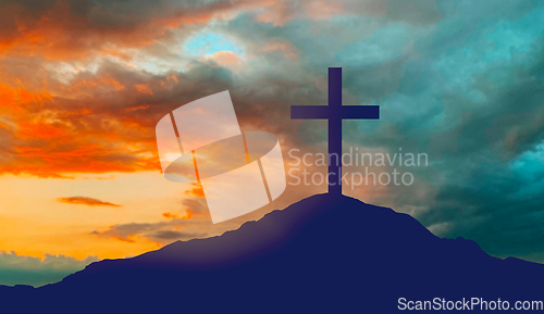 Image of silhouette of cross on calvary hill over sky