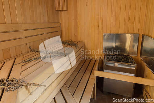 Image of Interior of a sauna in a private house with an electric boiler