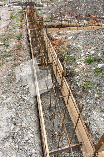 Image of Fragment of reinforcement of a shallowly buried strip foundation of a low-rise residential building
