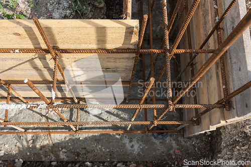 Image of Tied rebar and mounted formwork close-up, top view