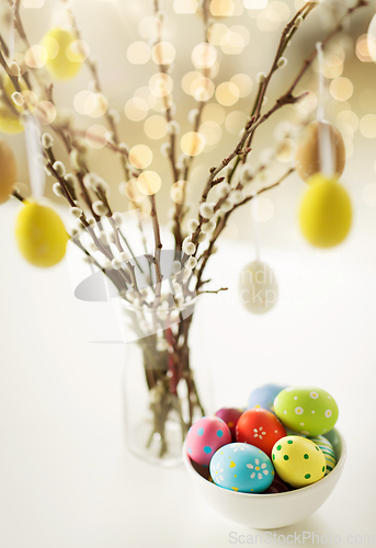 Image of close up of pussy willow branches and easter eggs